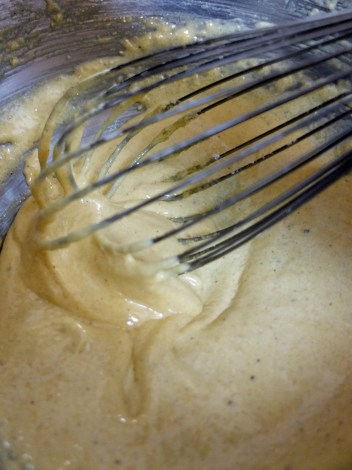 Whisk in the cornflour, ground almond, cinammon and almond extract