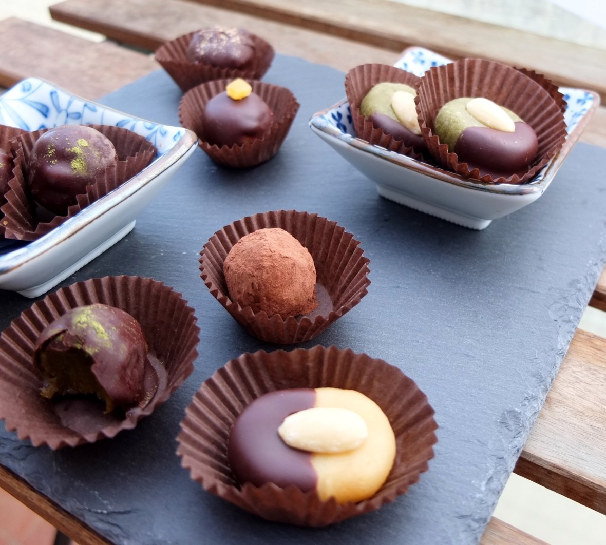 Healthier chocolate-covered matcha marzipans and date caramels