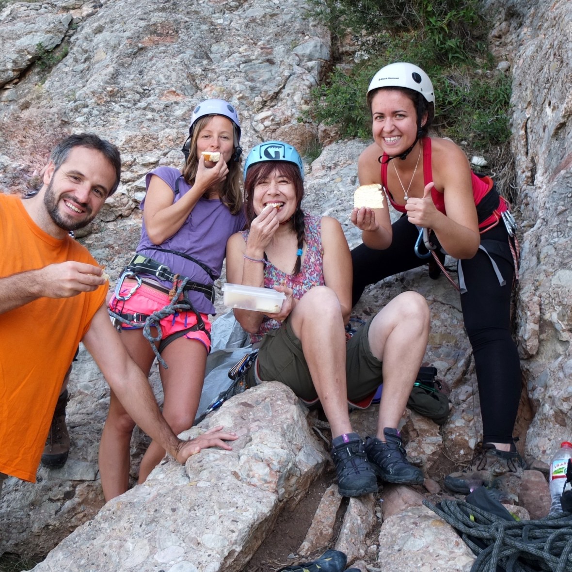 Climbers eating Japanese cheesecake at the rock