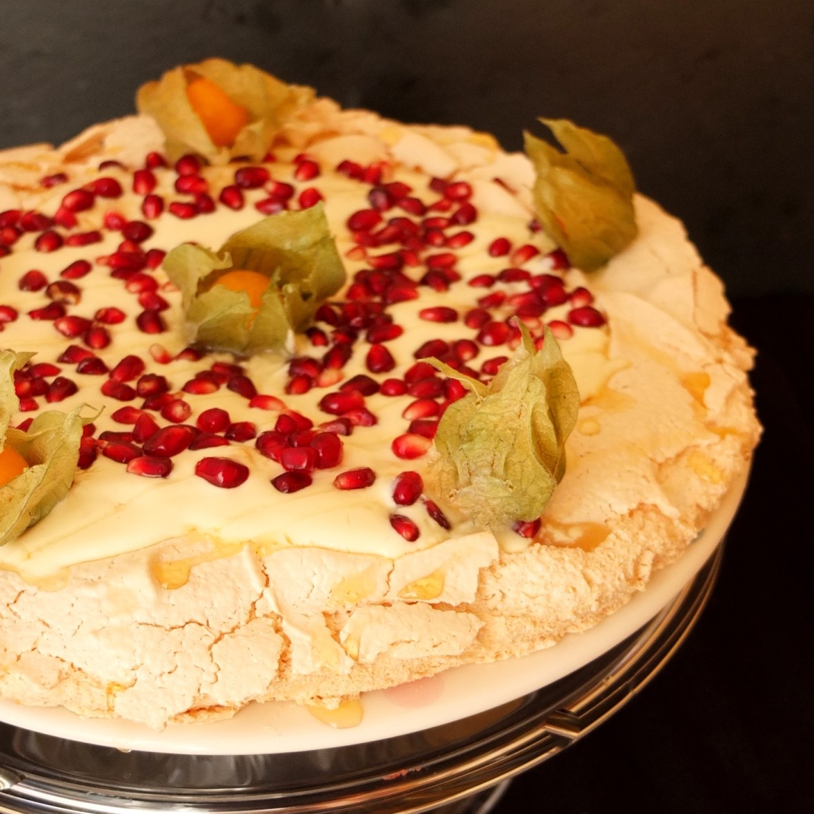Pomegranate and passion fruit yoghurt pavlova