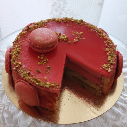 Very raspberry mousse cake with pistachios
