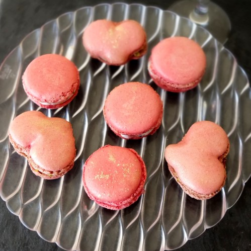 Raspberry curd, goats' cheese and black sesame macarons