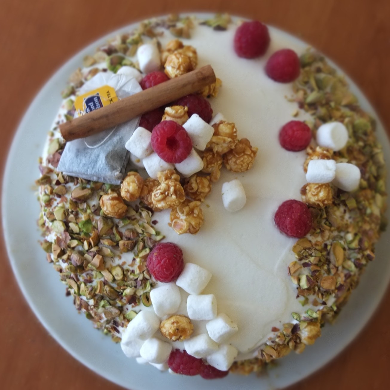 Masala chai, raspberry and pistachio layer cake