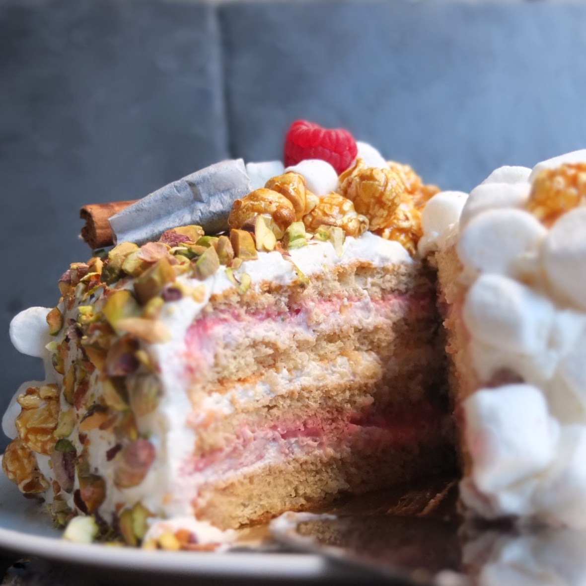 Masala chai, raspberry and pistachio layer cake