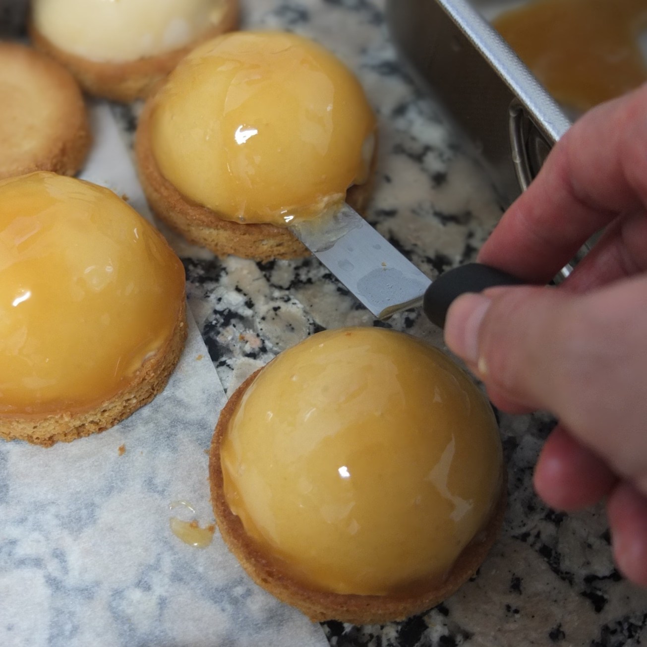 Caramel mousse domes on sablés bretons