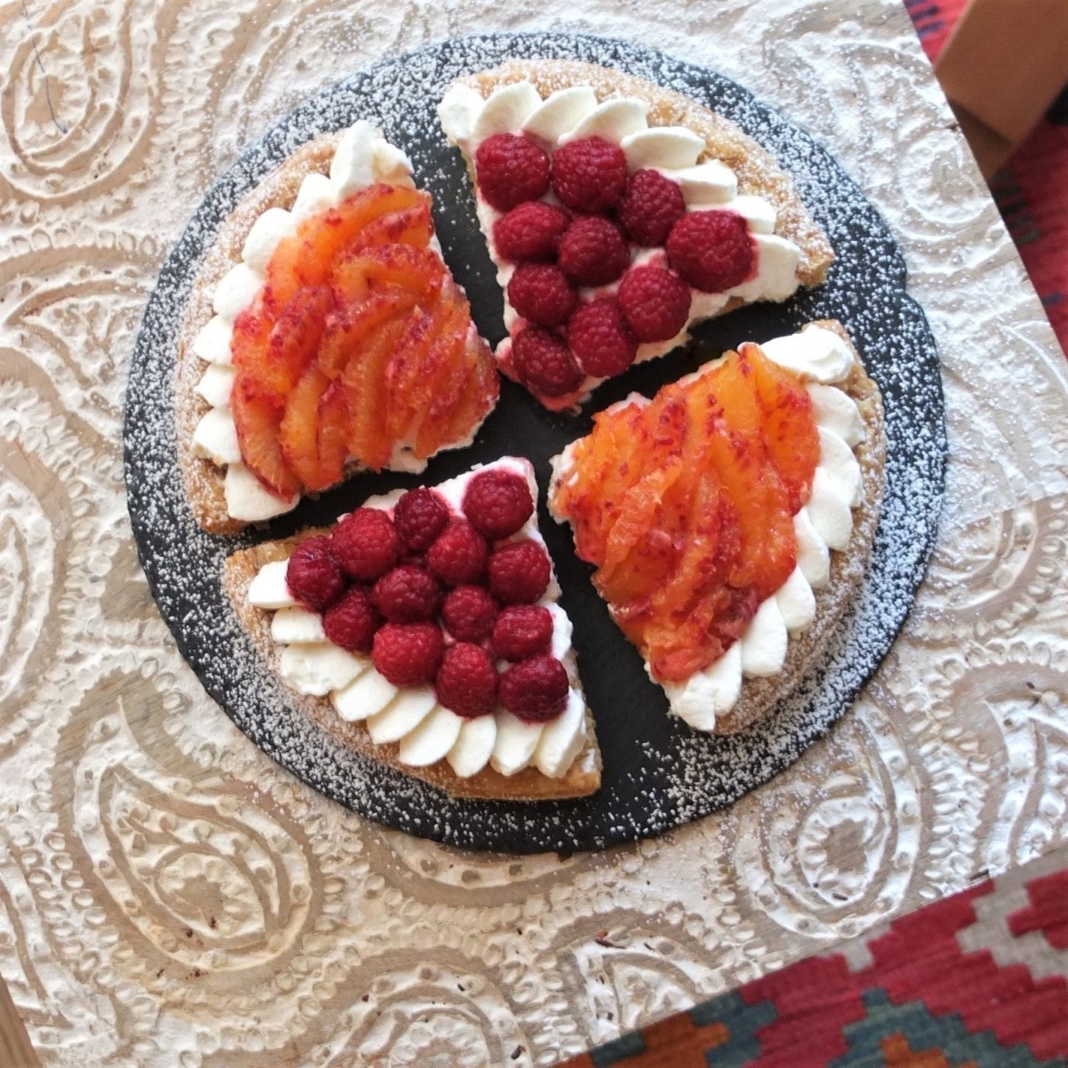 Fresh fruit and cream puff pastry tarts - with raspberries and blood oranges