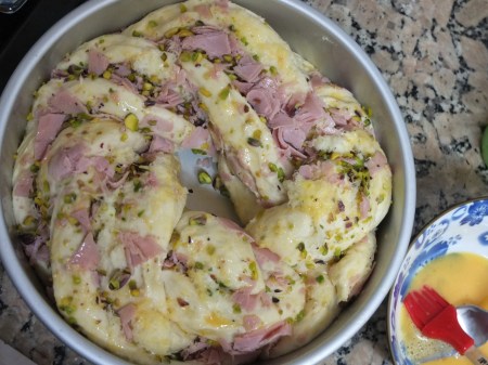 Brushing on the egg yolk