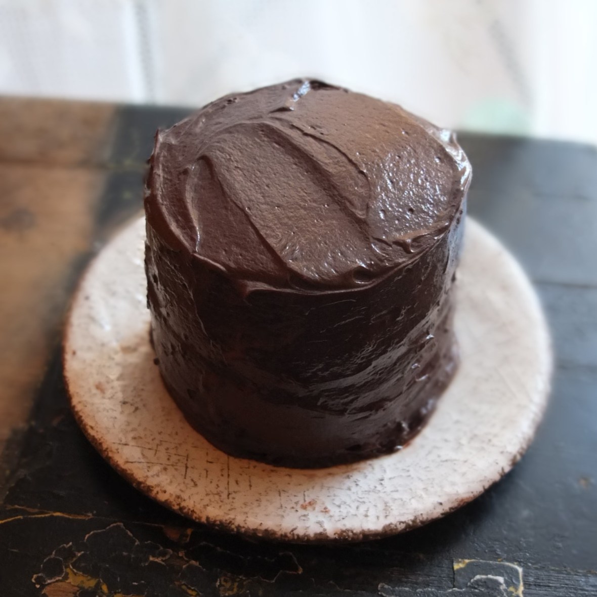 Vegan chocolate layer cake with aquafaba, spelt flour and coconut palm sugar