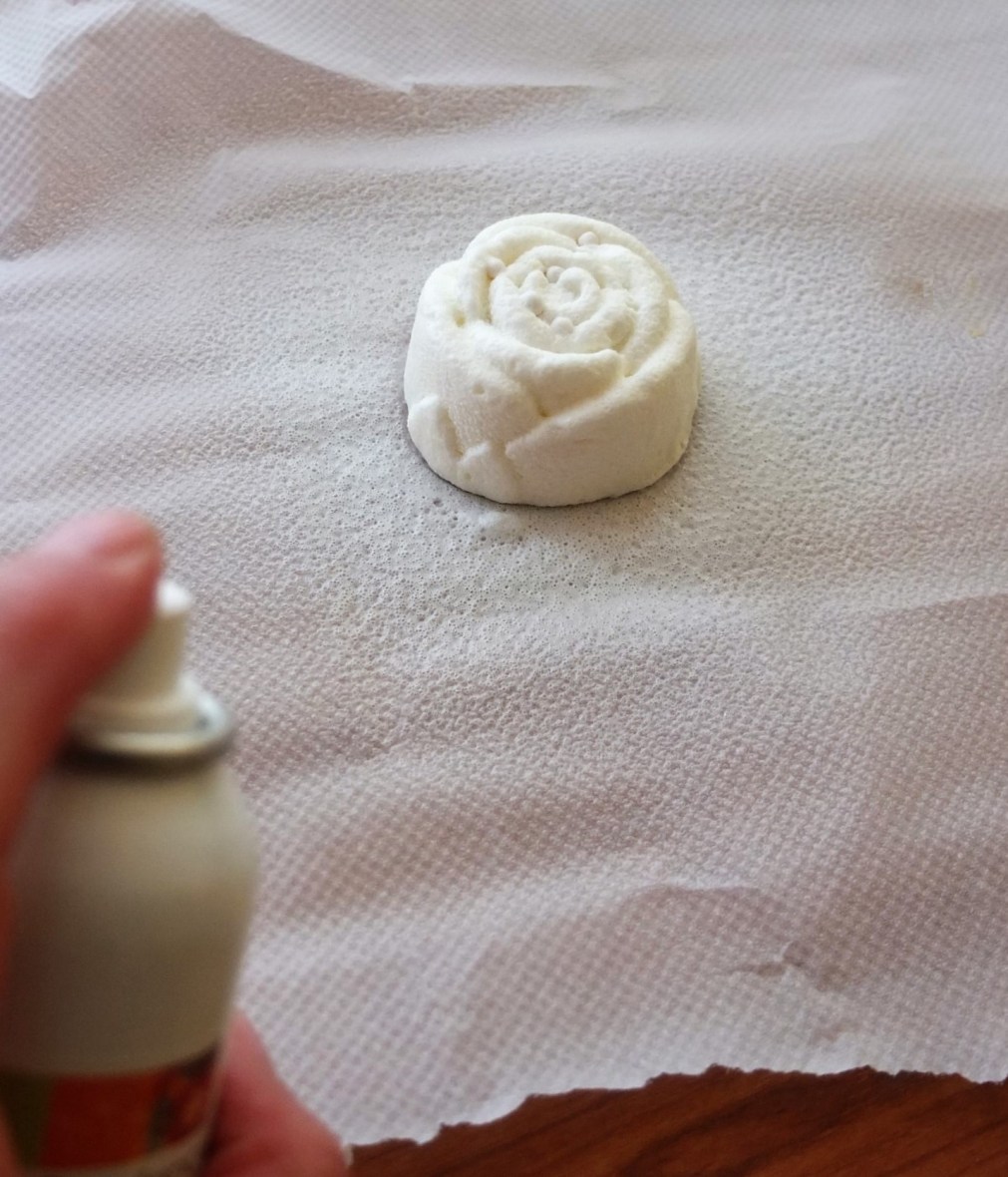 Velours or velvet spray on white citrus passion cakes