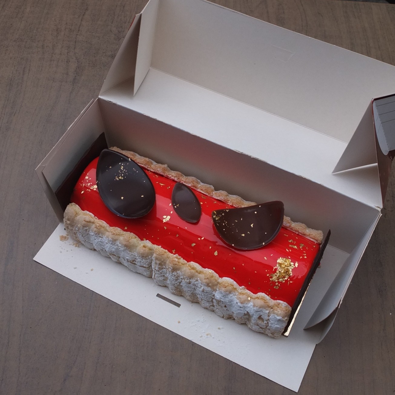 Passion fruit-raspberry yule log cake (bûche)