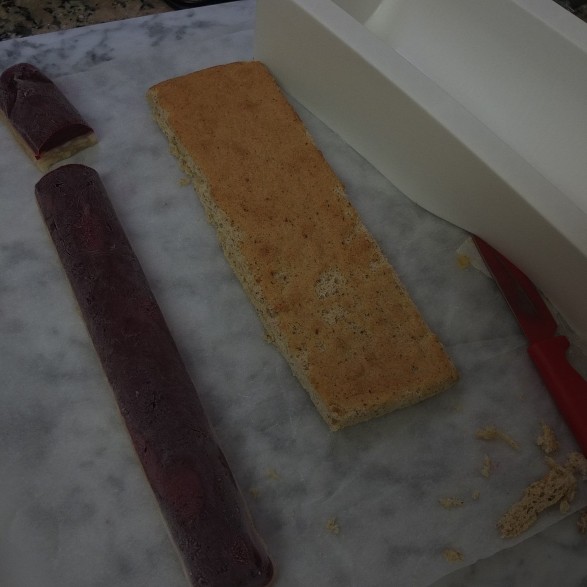 Preparing for assembly of log cake