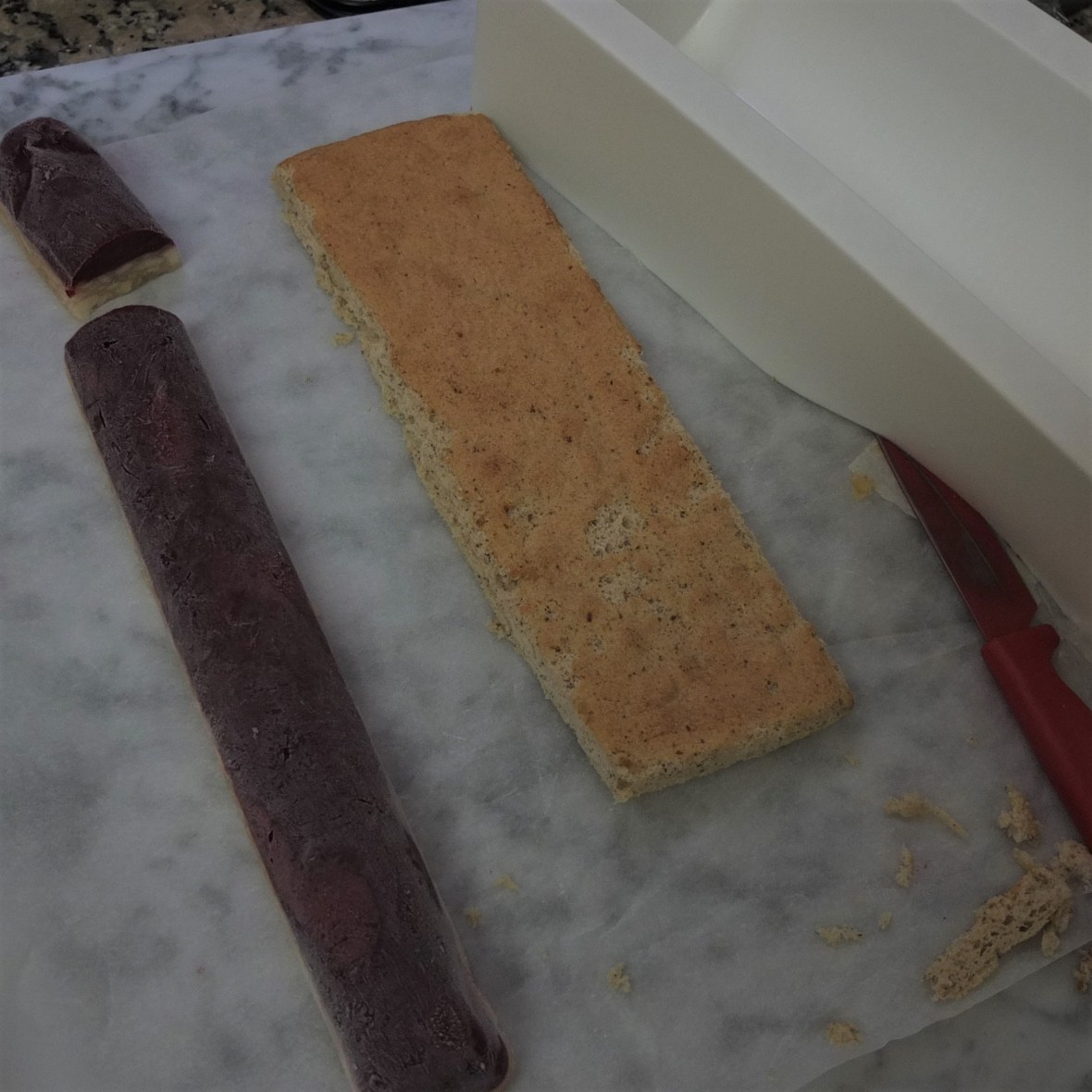 Preparing for assembly of log cake