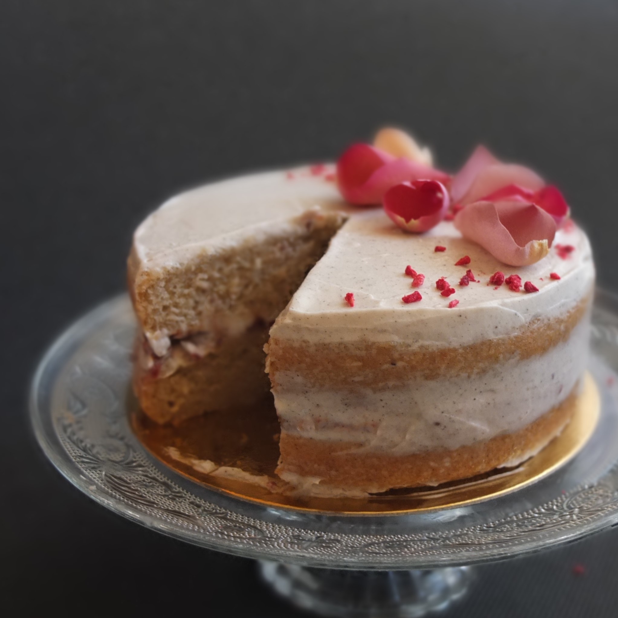 Healthier vegan raspberry, coconut and almond layer cake