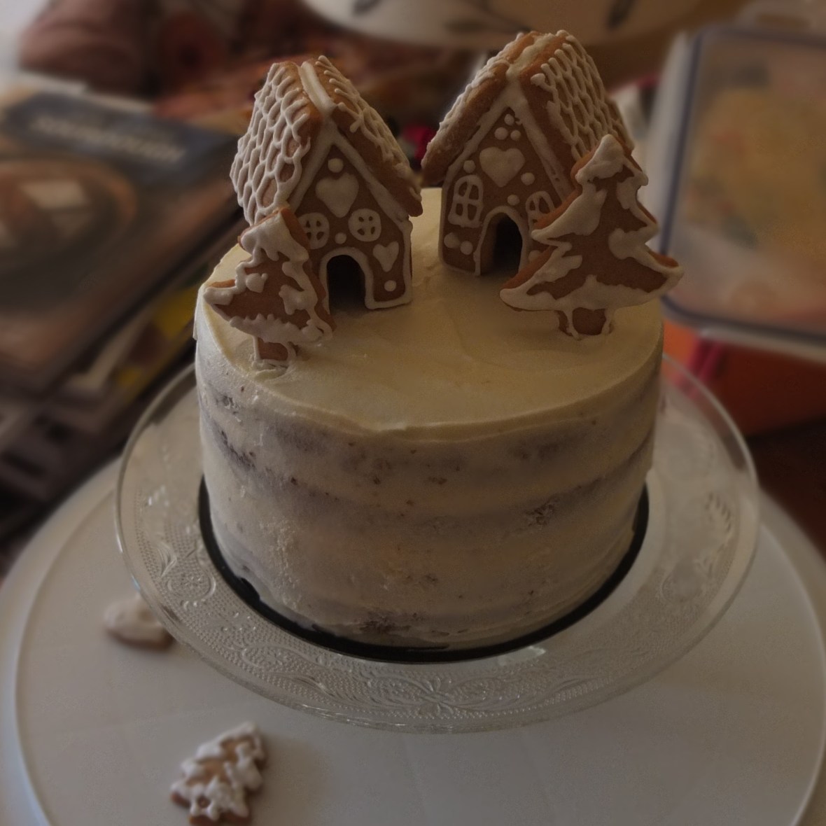 Mini houses on orange spiced cake