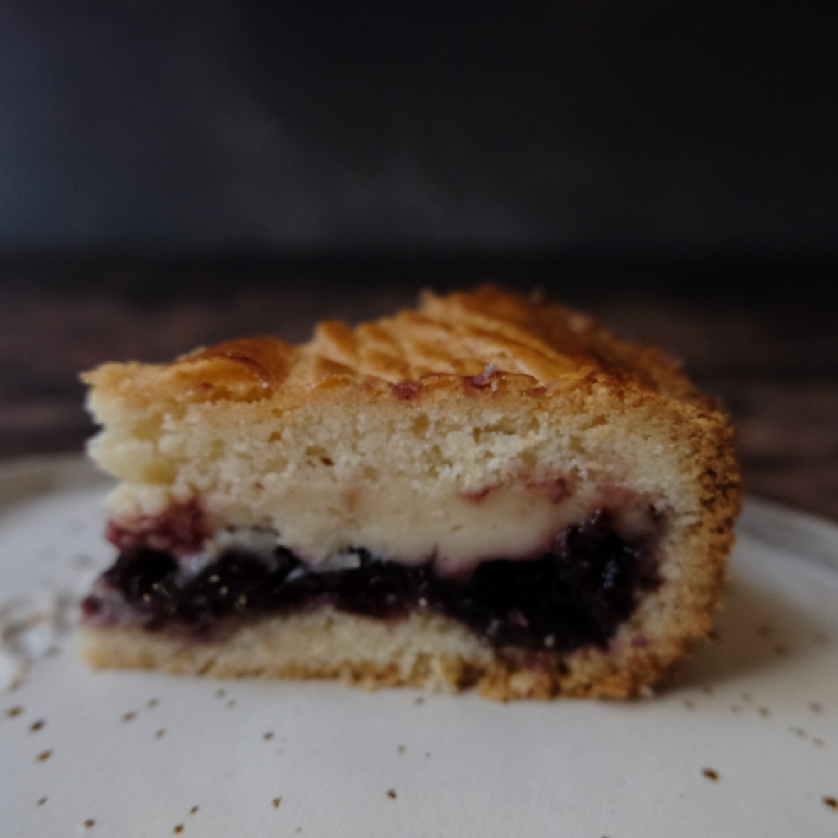 A slice of black cherry Gâteau Basque