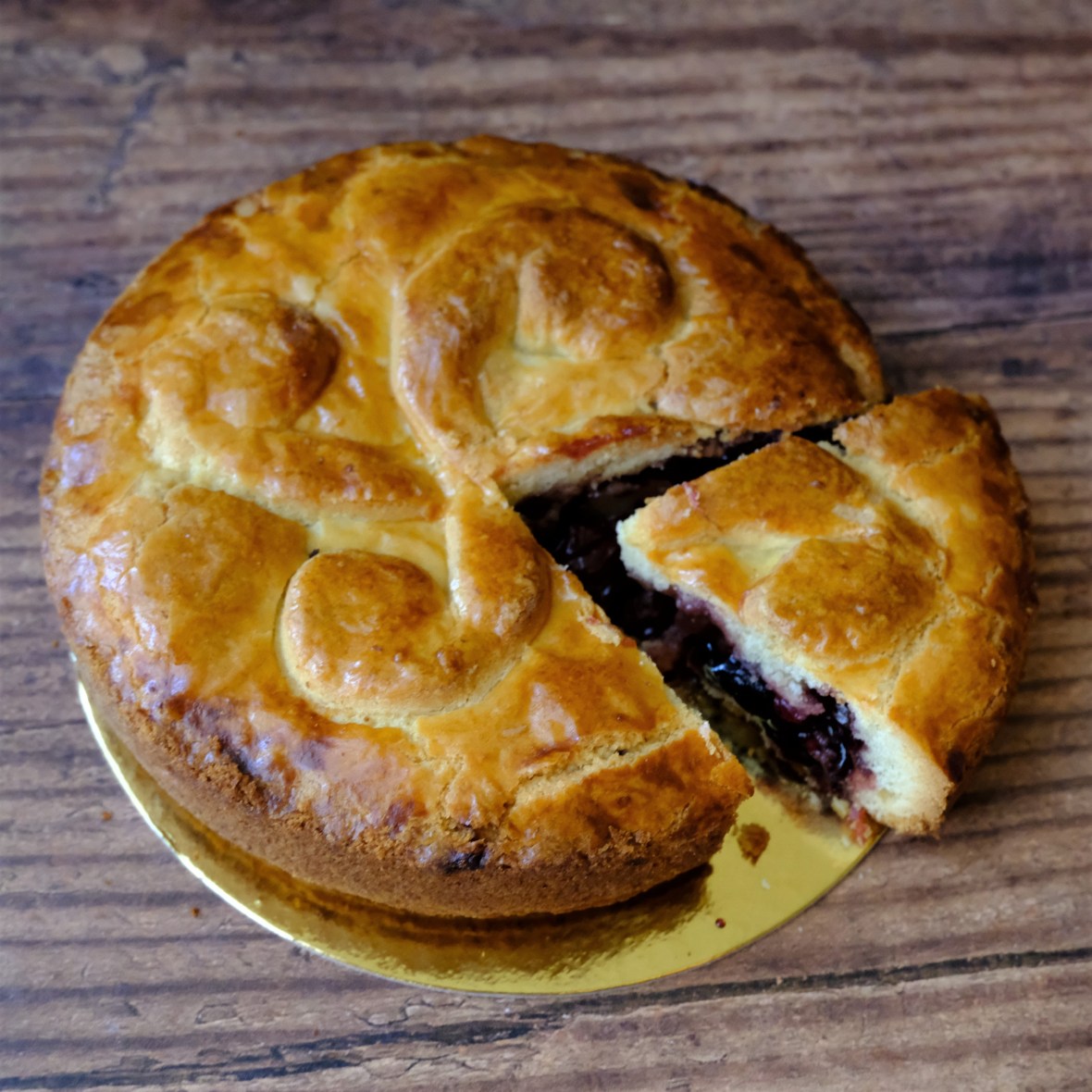 Sour cherry jam, redcurrant, walnut gateau basque