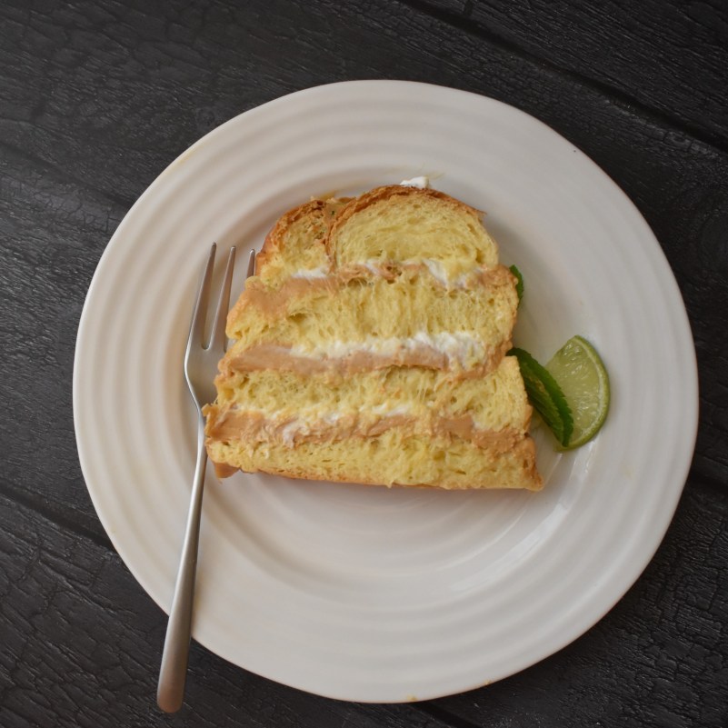 A slice of no-bake mojito brioche layer cake