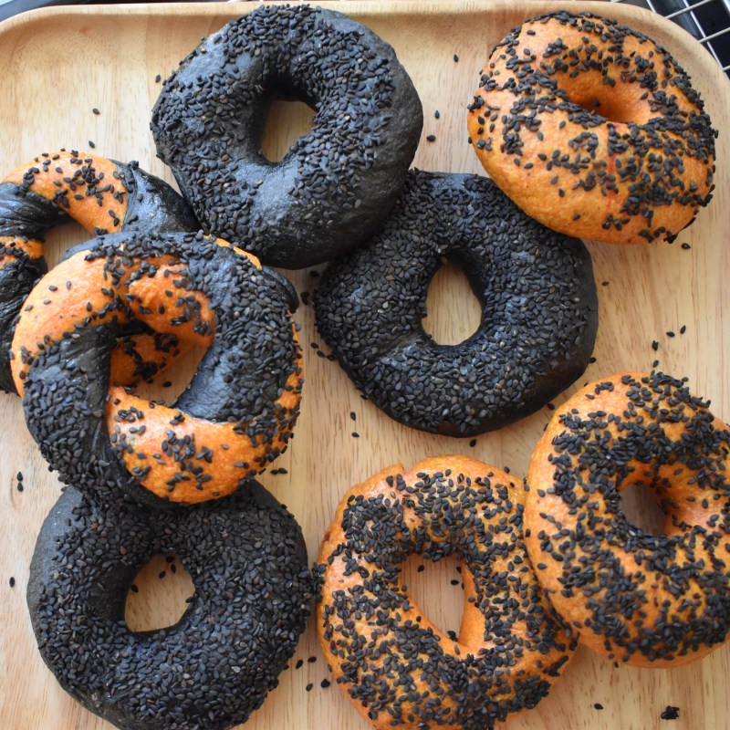 Halloween orange and black activated charcoal and turmeric sourdough bagels