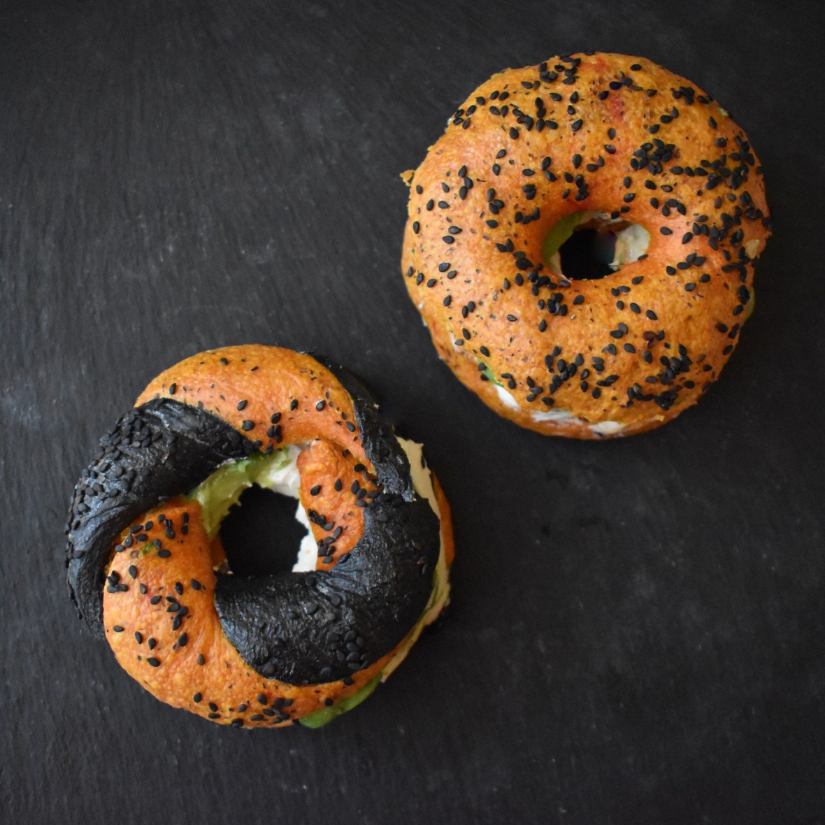 Turmeric and avocado sourdough bagels with cream cheese and avocado