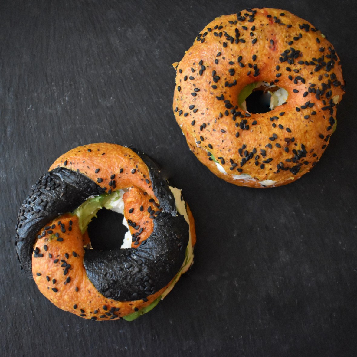 Turmeric and avocado sourdough bagels with cream cheese and avocado