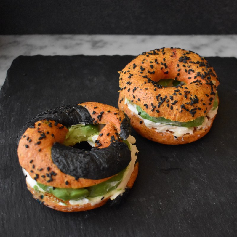 Turmeric and avocado sourdough bagels with cream cheese and avocado