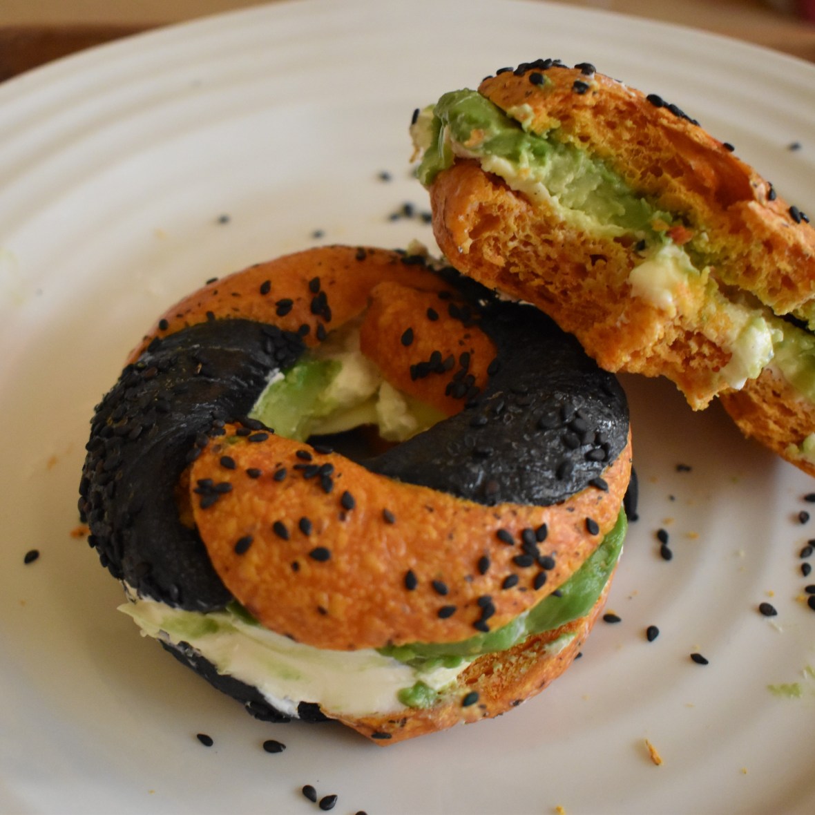 Turmeric and avocado sourdough bagels with cream cheese and avocado