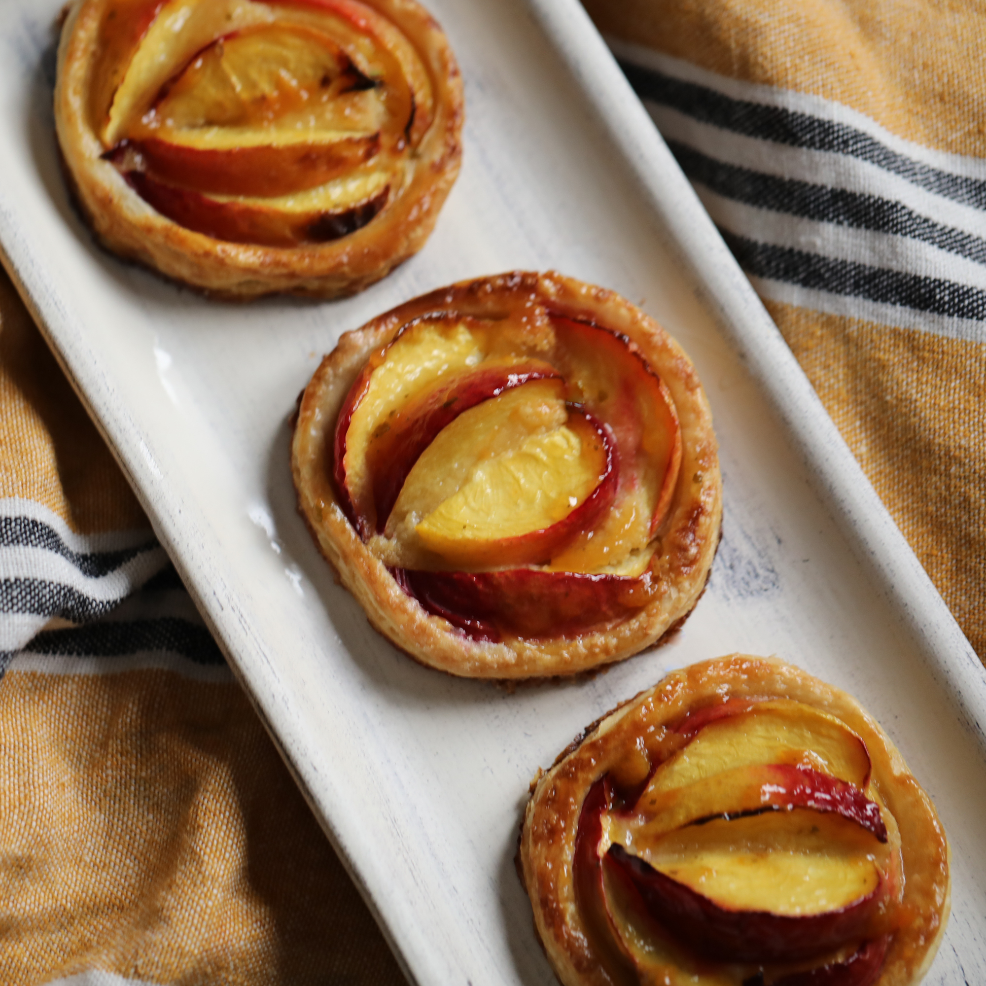 Caramelised puff pastry nectarine tarts recipe! lili's cakes
